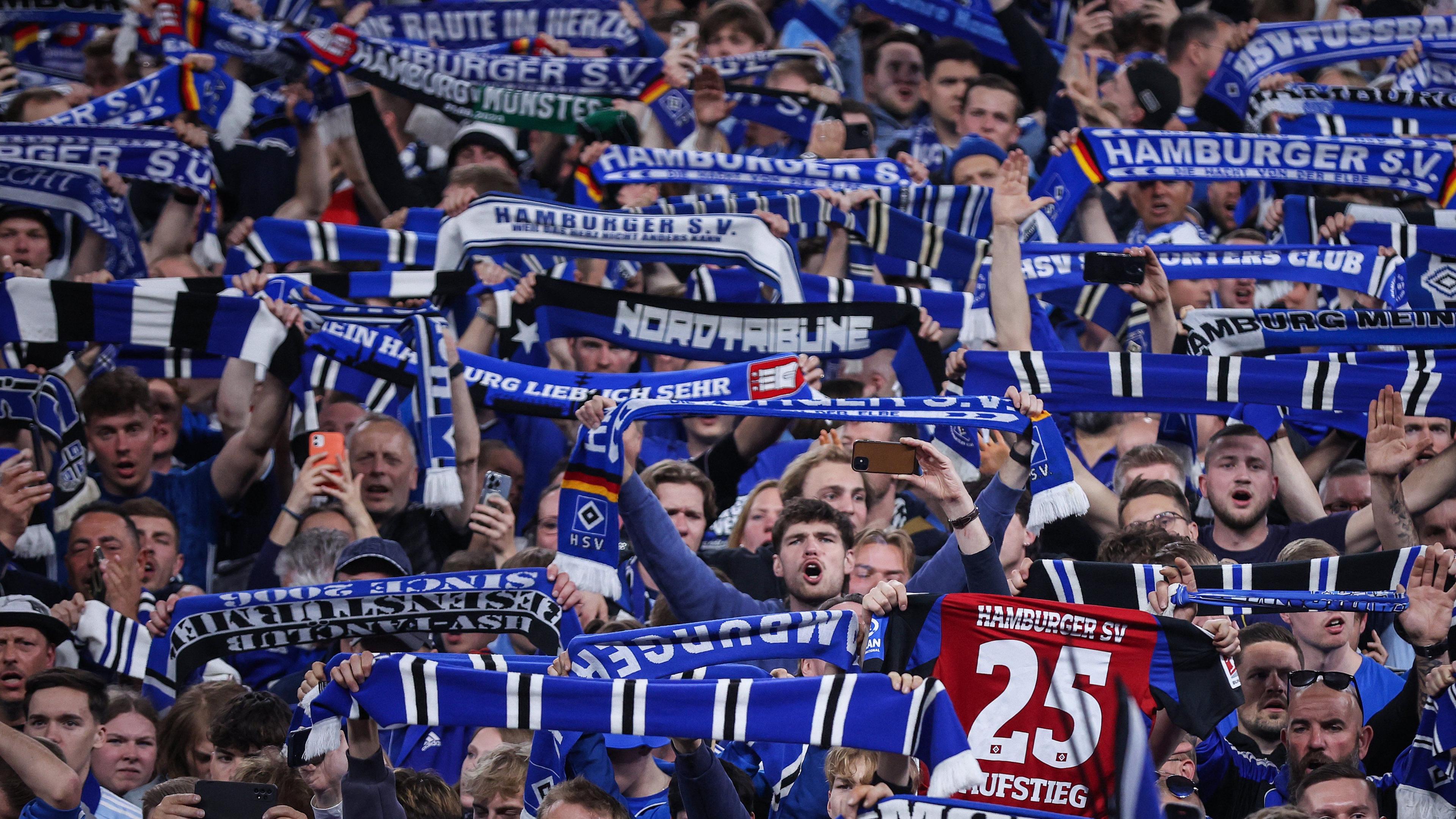 Hamburg pitch invasion hospitalises 25 fans
