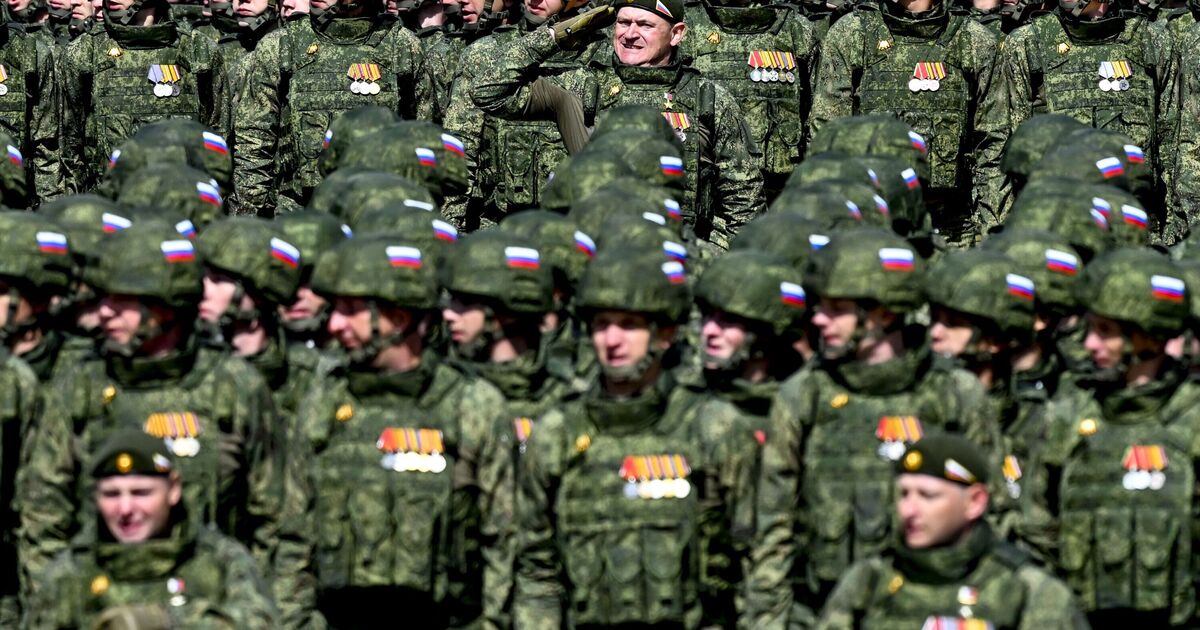 WW3 fears erupt as Vladimir Putin massing troops on border of NATO country